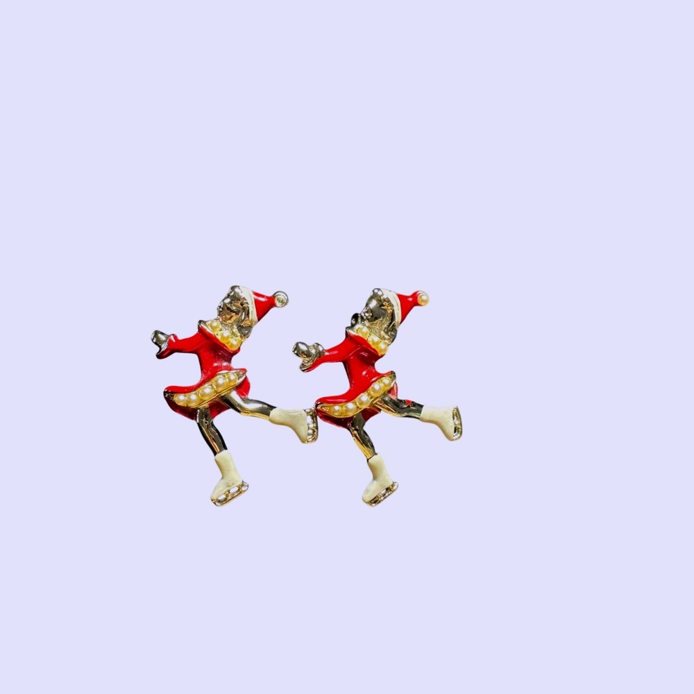 Vintage Red Enamel Ice Skating Mrs Claus Christmas Brooch Set of 2
Silvertone 2"